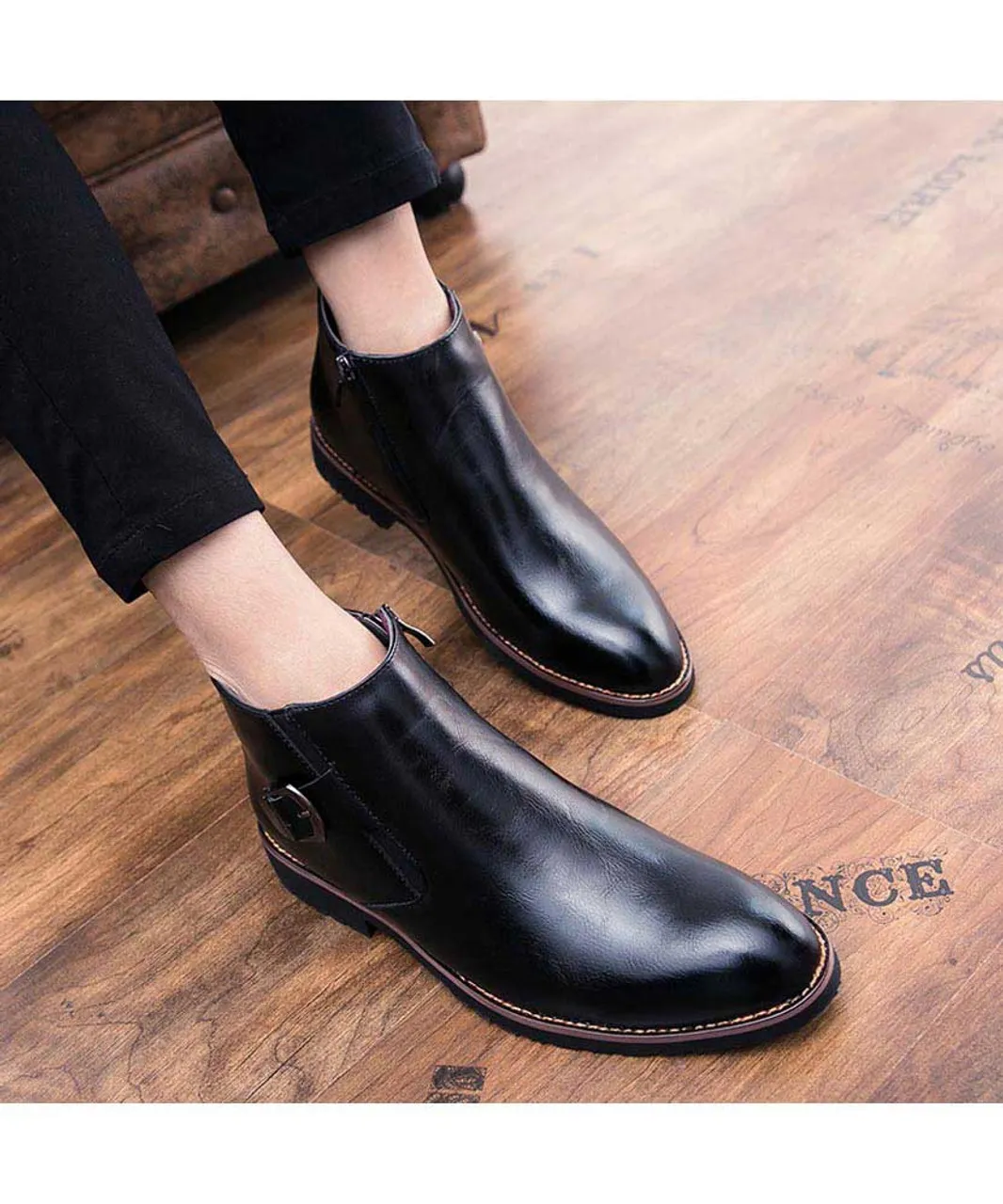 Black buckle slip on dress shoe boot with zip on side