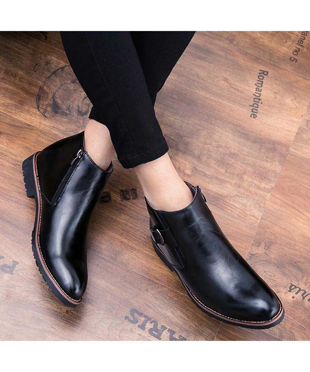 Black buckle slip on dress shoe boot with zip on side